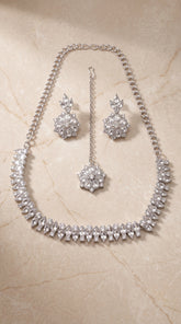 Zelya Silver Crystal Floral Necklace Set with Earrings & Maang Tikka for Women