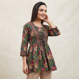 Women’s Green Floral Printed Short Kurti with Waist Tie-Up & 3/4 Sleeves