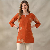 Women’s Orange Floral Printed Short Kurti with 3/4 Sleeves