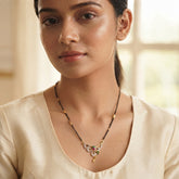 Zelya Anti-Tarnish Gold Mangalsutra | Elegant Floral Pendant with Black Beads