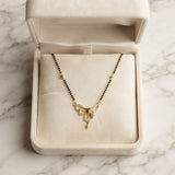 Zelya Anti-Tarnish Gold Mangalsutra | Elegant Floral Pendant with Black Beads