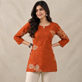 Women’s Orange Floral Printed Short Kurti with 3/4 Sleeves