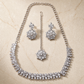 Zelya Silver Crystal Floral Necklace Set with Earrings & Maang Tikka for Women