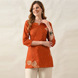 Women’s Orange Floral Printed Short Kurti with 3/4 Sleeves